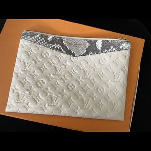 COPY - Louis Vuitton Clutch with Snake Skin accent. Has never been used.